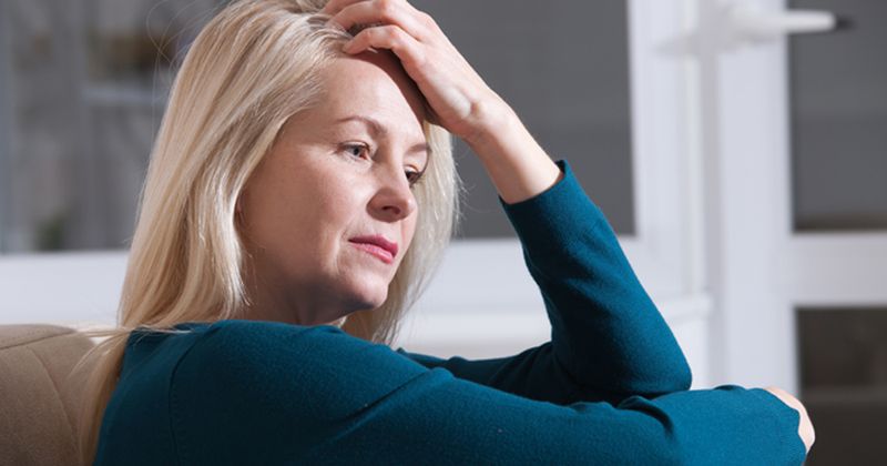 Woman experiencing menopause