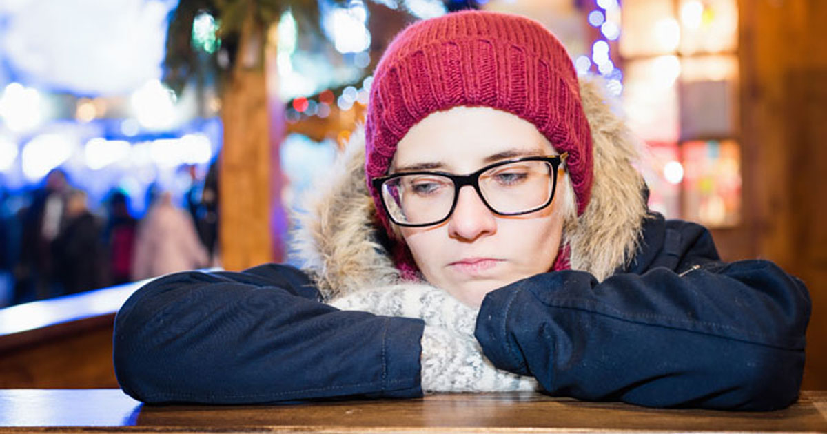 Woman looking sad during the holidays