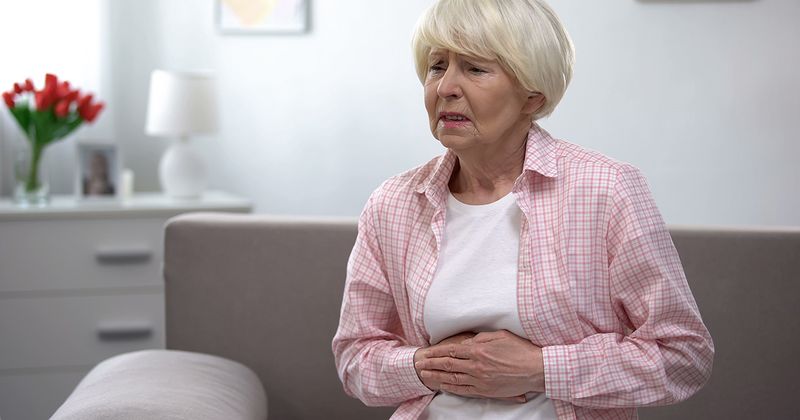 Woman stomach pain