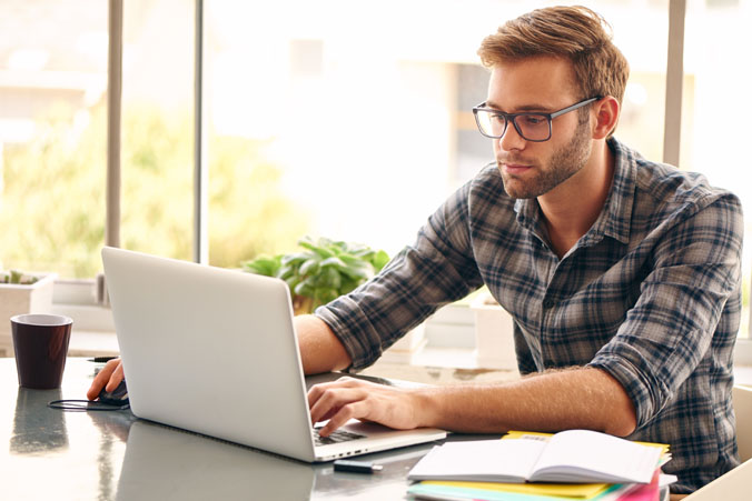 Image of man on computer