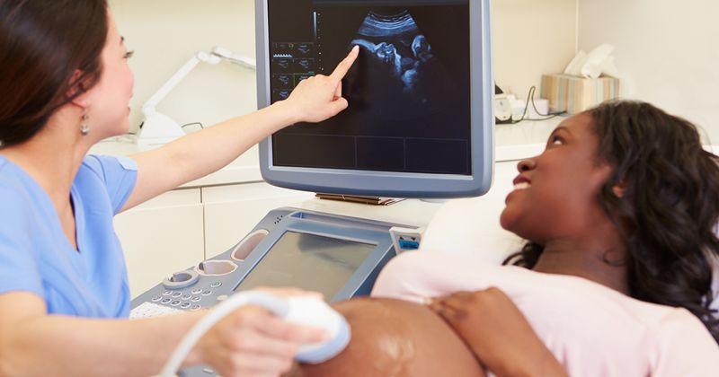 Black woman receives 4D ultrasound scan