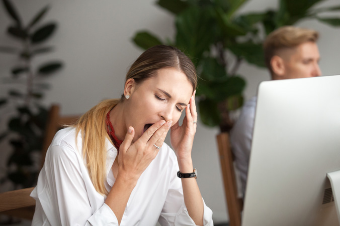 Woman yawning