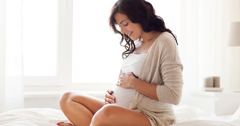 Photo of happy pregnant woman