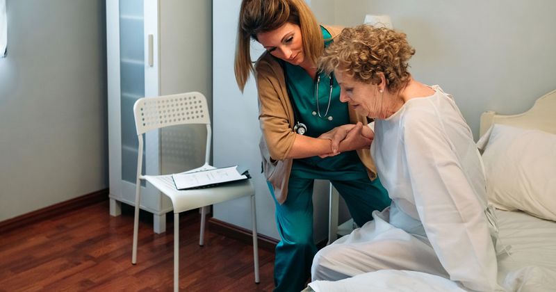 stock image of nurse and patient