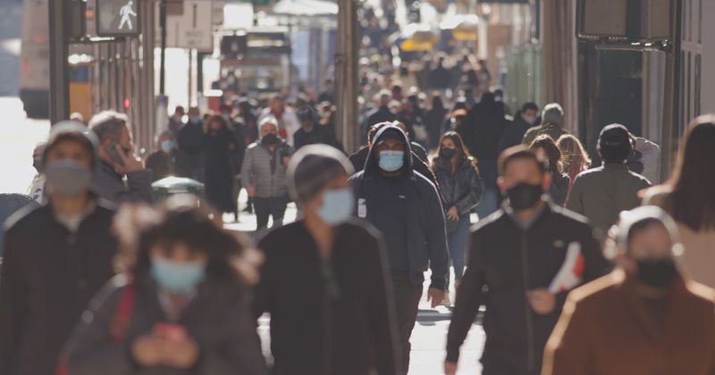 Crowd with masks