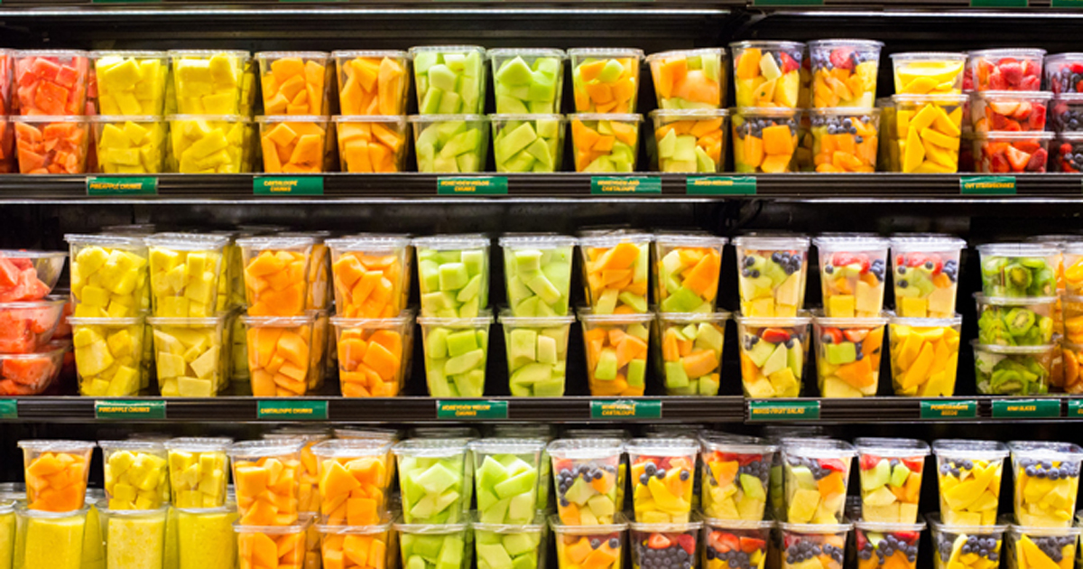 A photo of pre-cut produce in a grocery store.