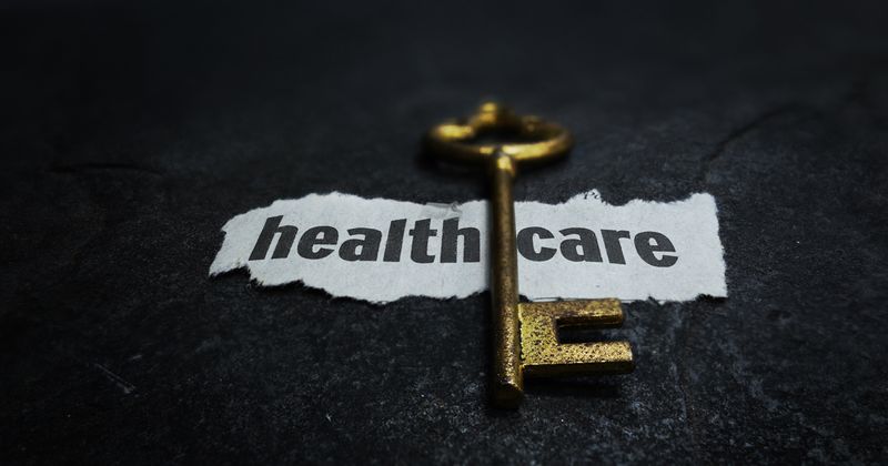 key on top of the words health care