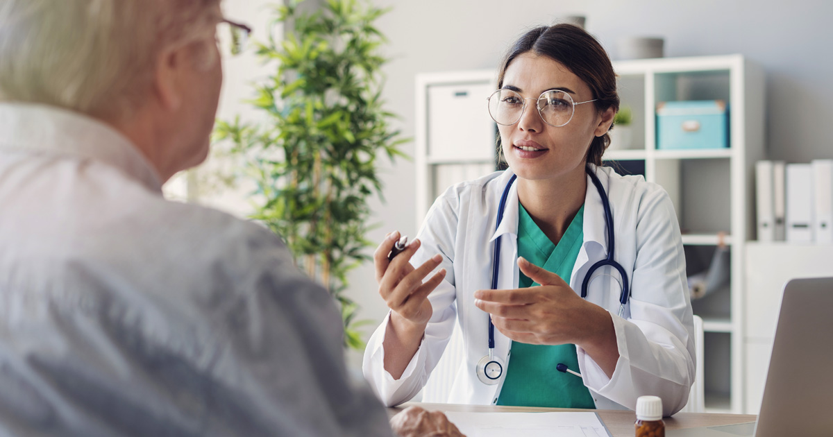 Doctor talking to patient