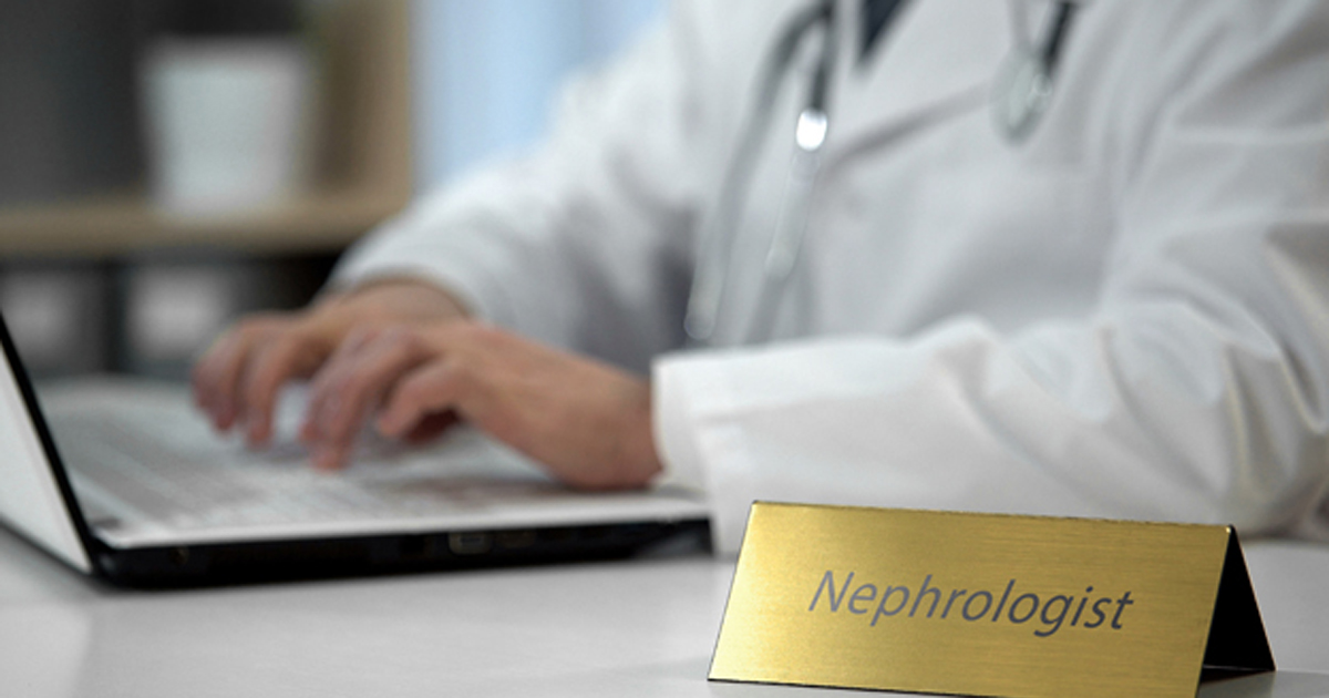 Nephrologist at desk