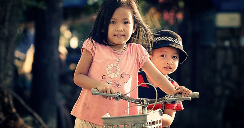 Preschoolers with bike