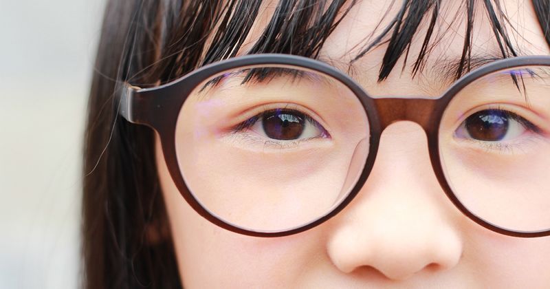 Asian woman with glasses