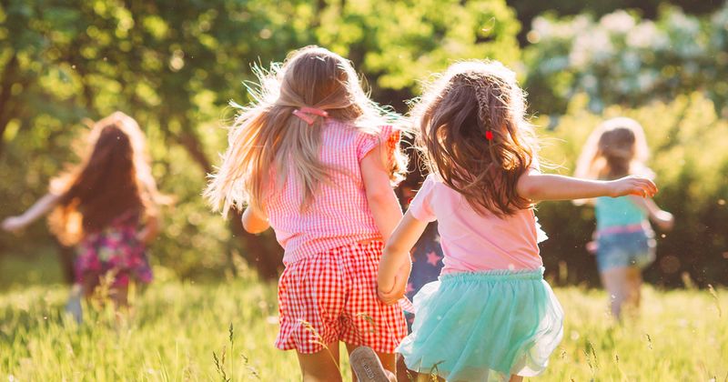 girls running Adobe Stock