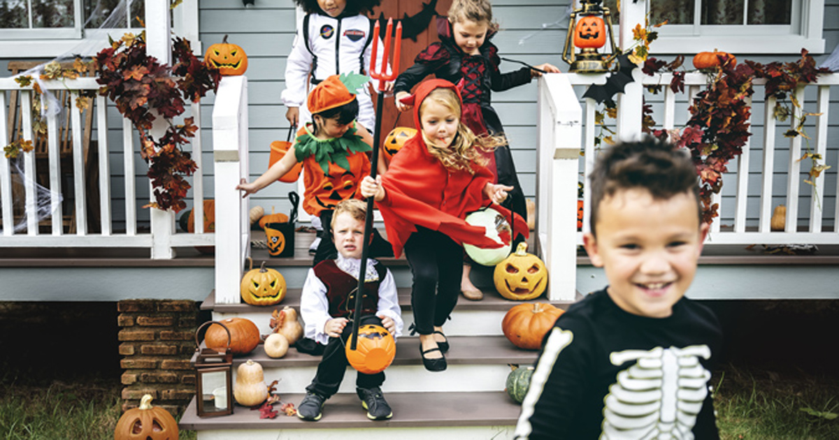 Kids running around and trick-or-treating