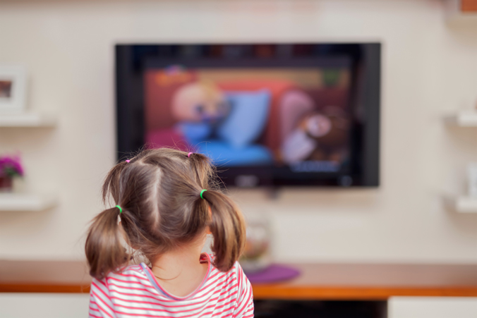 Image of little girl watching TV