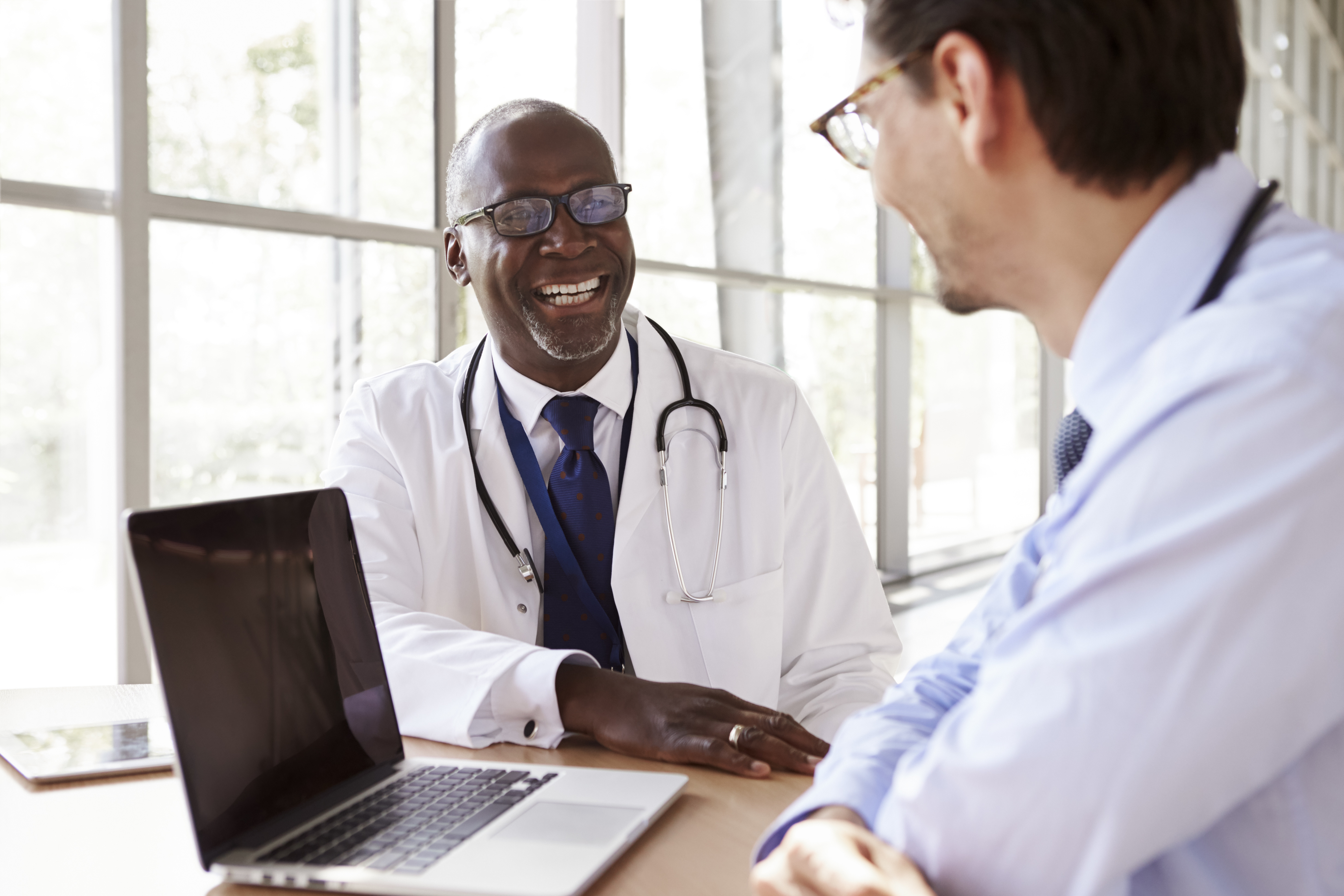 Image of physicians laughing