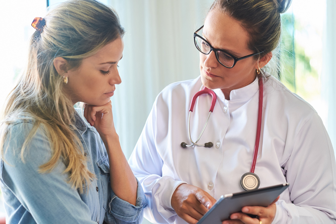 Image of doctor and female patient