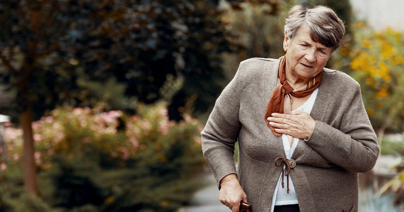 Older woman having a breathlessness attack