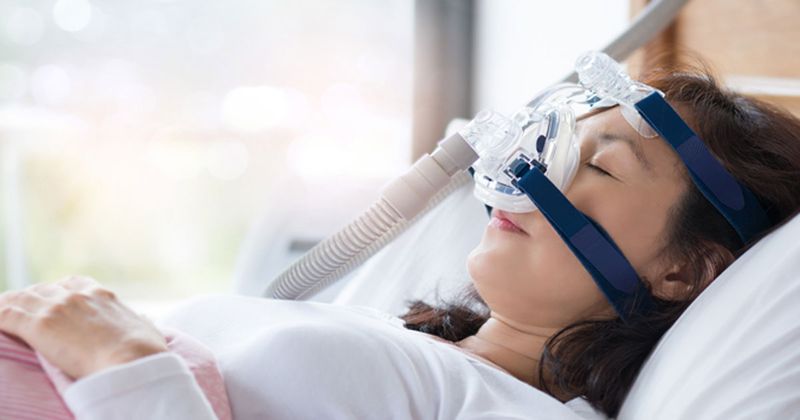 Woman using CPAP