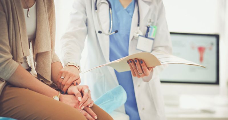 Doctor with female patient