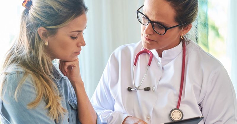 doctor with female patient