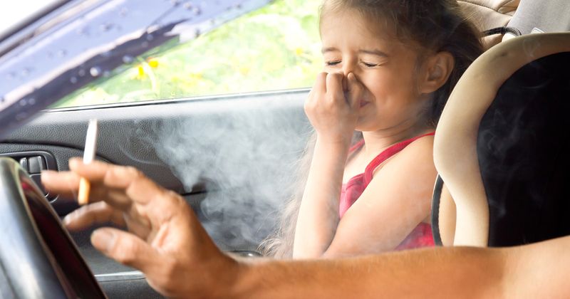 Parent smoking in front of child