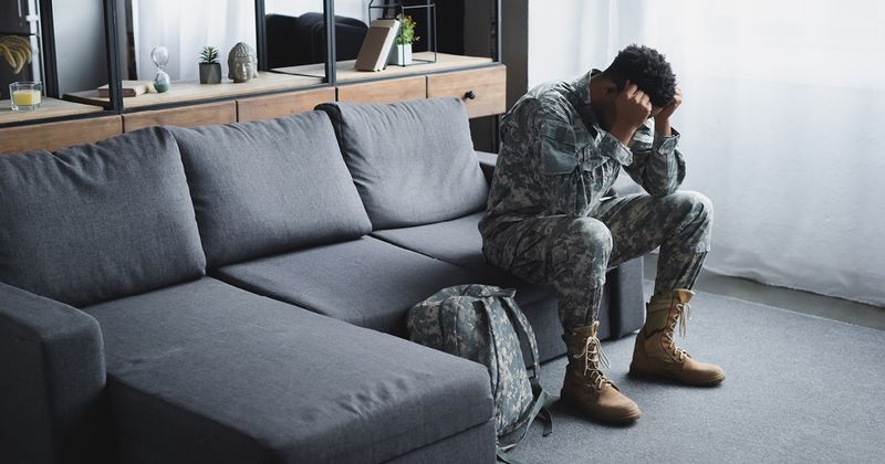 African American soldier suffering with PTSD