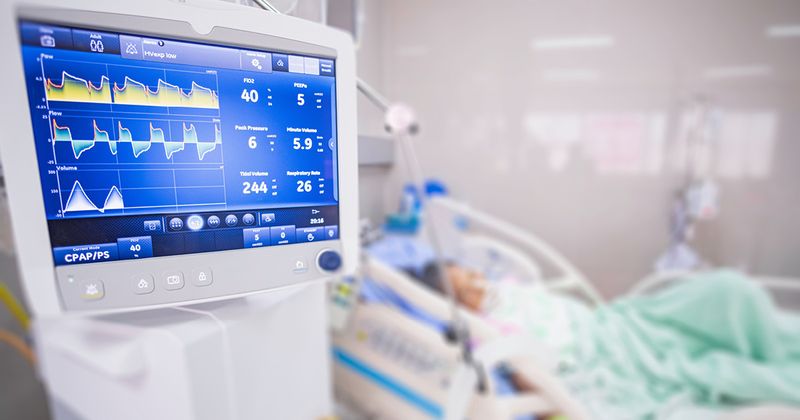 Ventilator monitor given oxygen by intubation tube to patient in ICU.